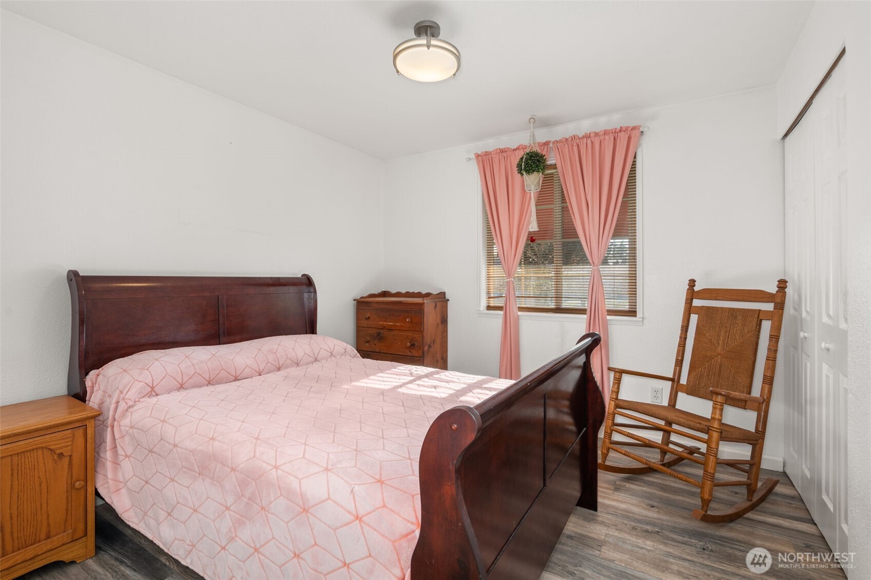 5916 187th Lane Southwest Rochester, WA 98579 - Photo 15 of 39 a bedroom with a bed and a window