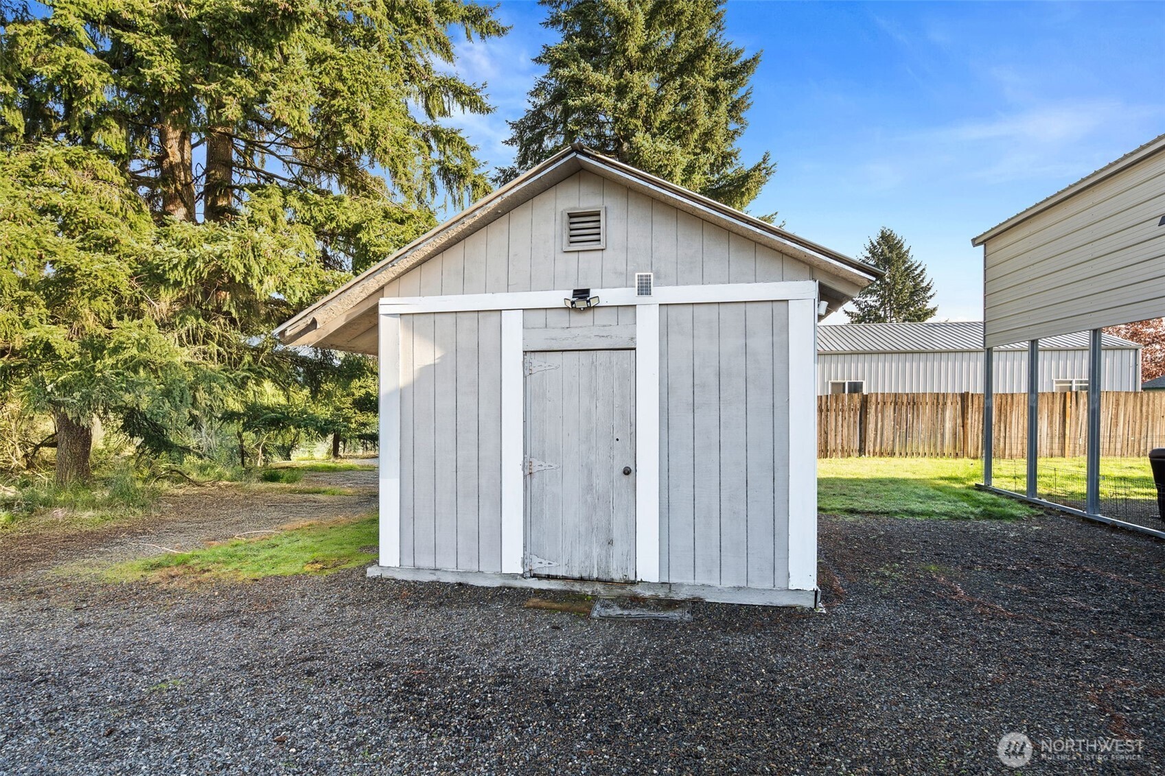 5916 187th Lane Southwest Rochester, WA 98579 - Photo 30 of 39 a view of a house with backyard and garden
