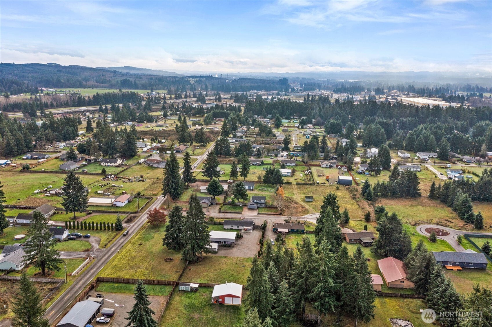5916 187th Lane Southwest Rochester, WA 98579 - Photo 34 of 39 an aerial view of a city with lots of residential buildings
