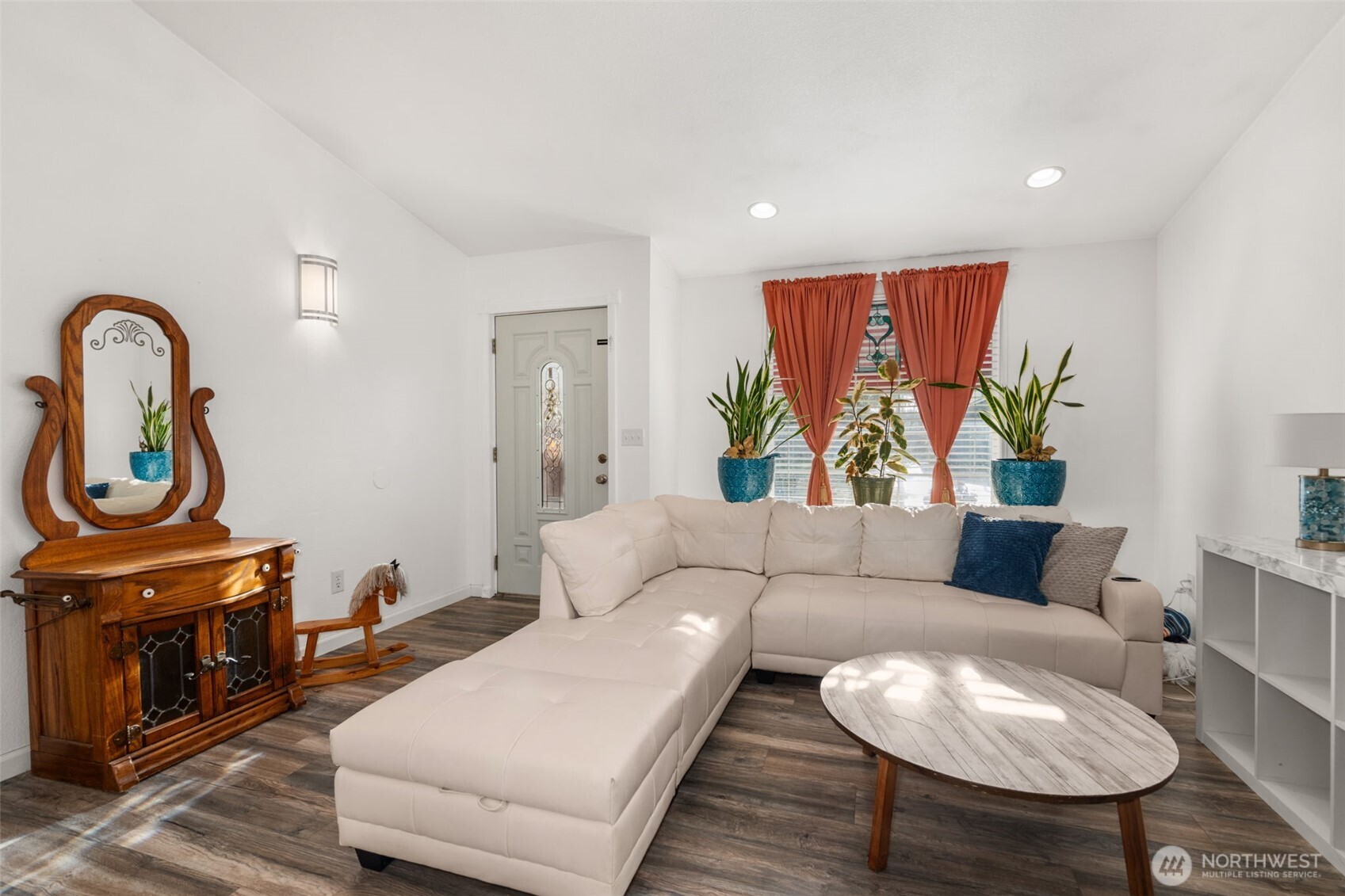5916 187th Lane Southwest Rochester, WA 98579 - Photo 6 of 39 a living room with furniture and a fireplace