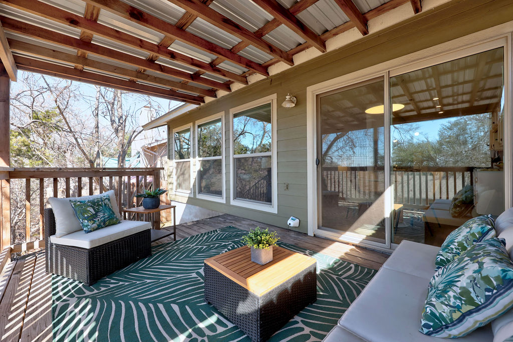 6486 Hart Lane Austin, TX 78731 - Photo 20 of 28 Wooden terrace featuring an outdoor hangout area