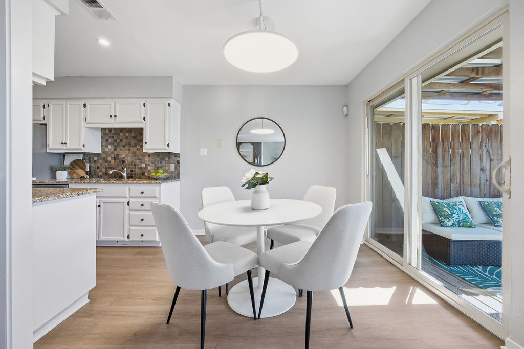 6486 Hart Lane Austin, TX 78731 - Photo 7 of 28 Dining area featuring light wood-style flooring and recessed lighting