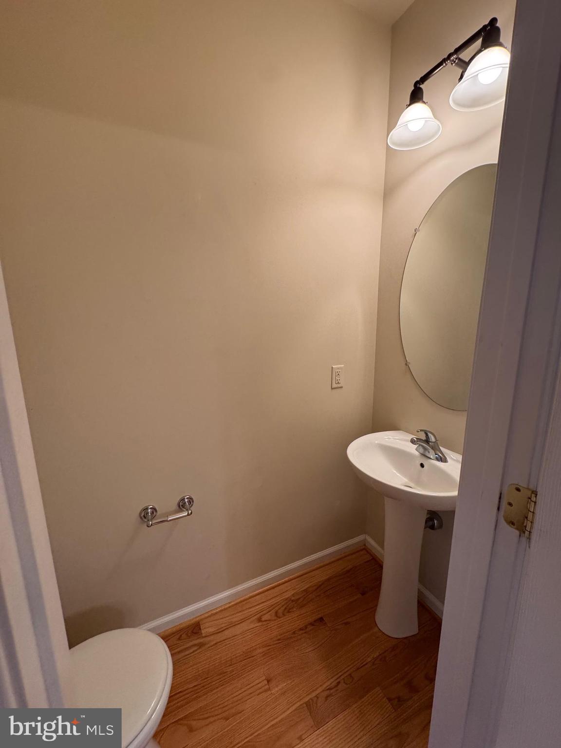 431 West Baltimore Street, Unit A Greencastle, PA 17225 - Photo 15 of 23 a bathroom with a sink toilet and a mirror