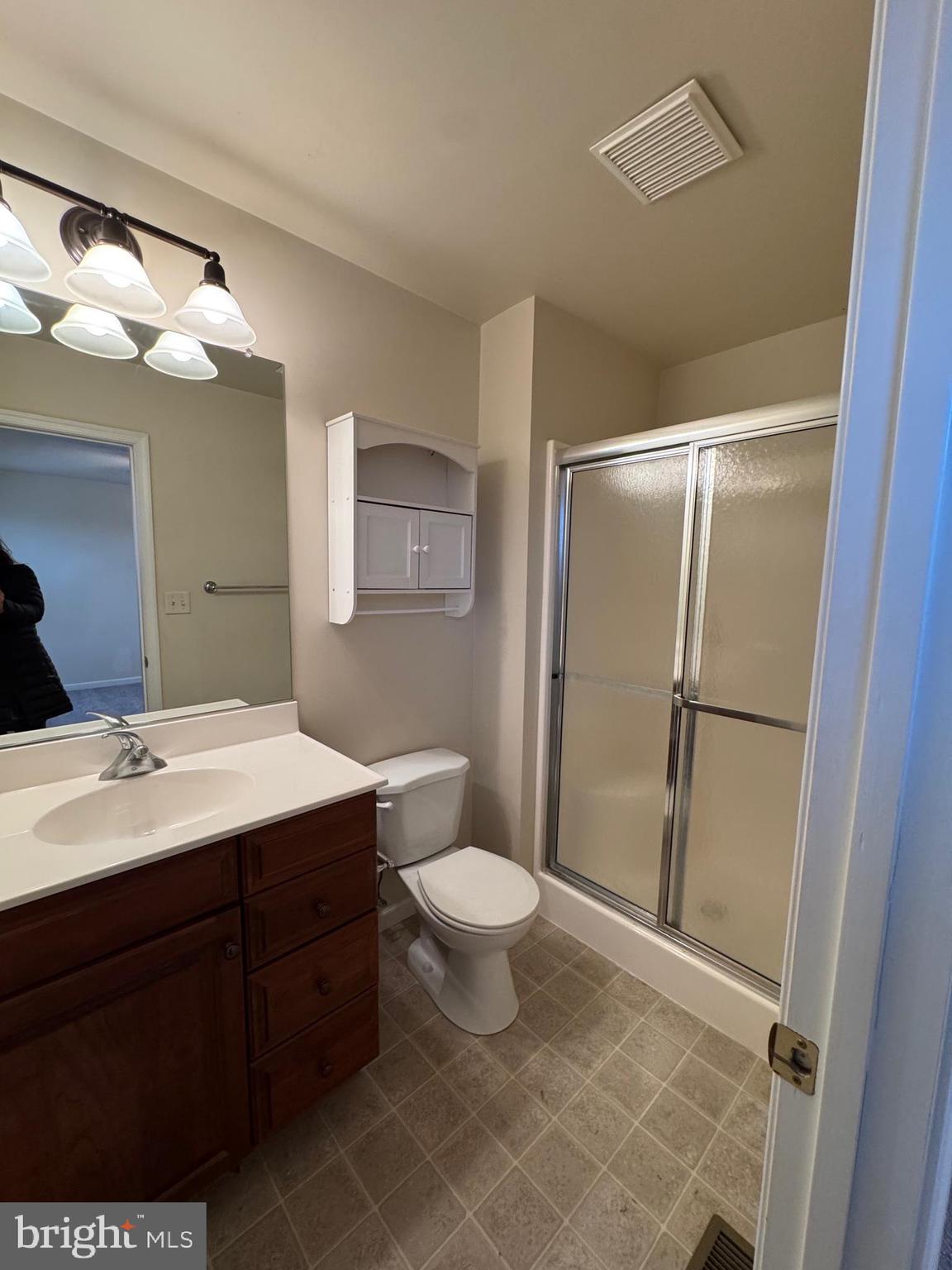 431 West Baltimore Street, Unit A Greencastle, PA 17225 - Photo 17 of 23 a bathroom with a sink toilet vanity and shower
