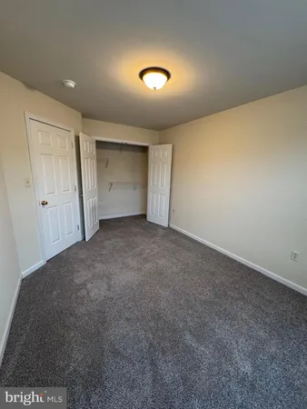 an empty room with a fireplace