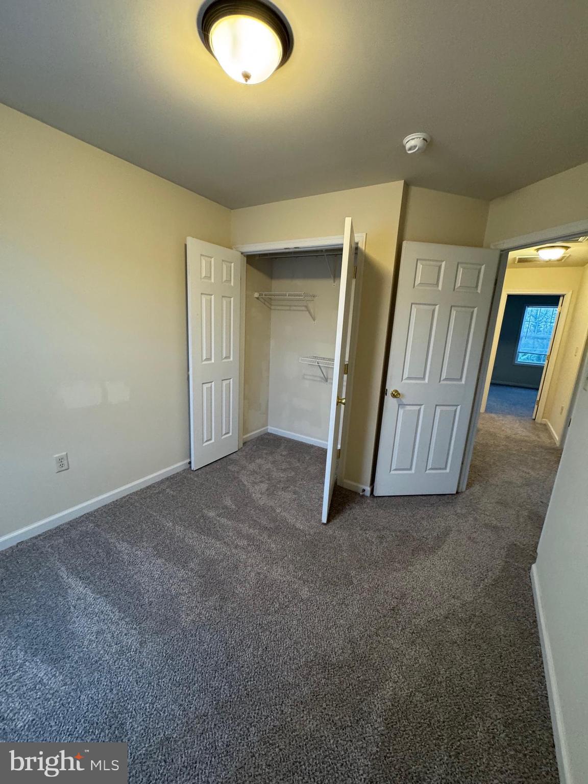 431 West Baltimore Street, Unit A Greencastle, PA 17225 - Photo 21 of 23 an empty room with a fireplace