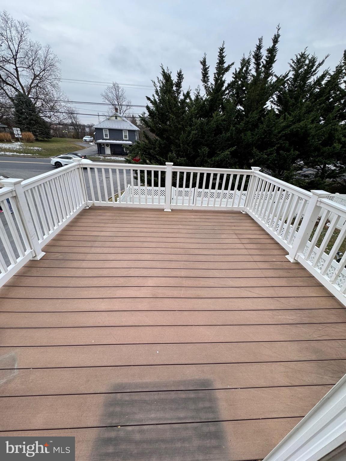 431 West Baltimore Street, Unit A Greencastle, PA 17225 - Photo 5 of 23 a view of deck space with swimming pool and trees