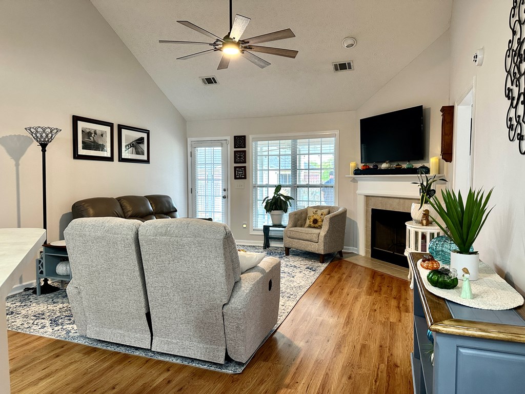 8013 Silverado Drive Columbus, GA 31909 - Photo 17 of 47 a living room with furniture fireplace and a flat screen tv