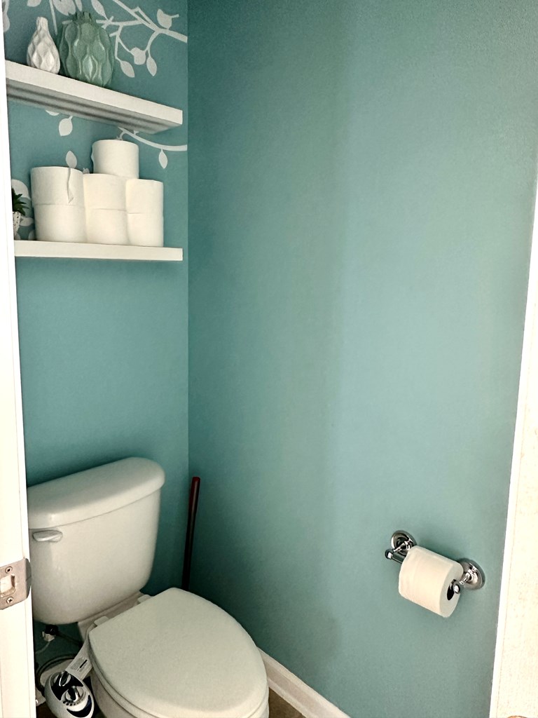 8013 Silverado Drive Columbus, GA 31909 - Photo 29 of 47 a white toilet sitting next to a bathroom sink