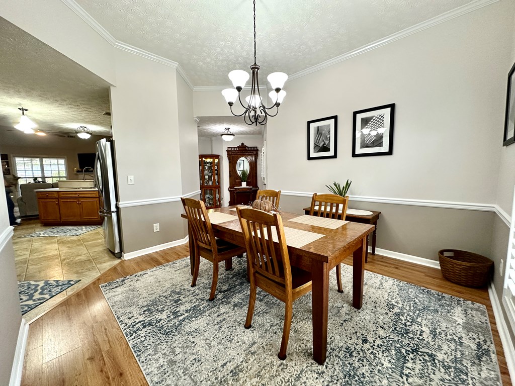8013 Silverado Drive Columbus, GA 31909 - Photo 6 of 47 a view of a dining room with furniture