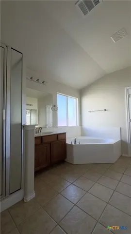 a large white tub sitting in a room