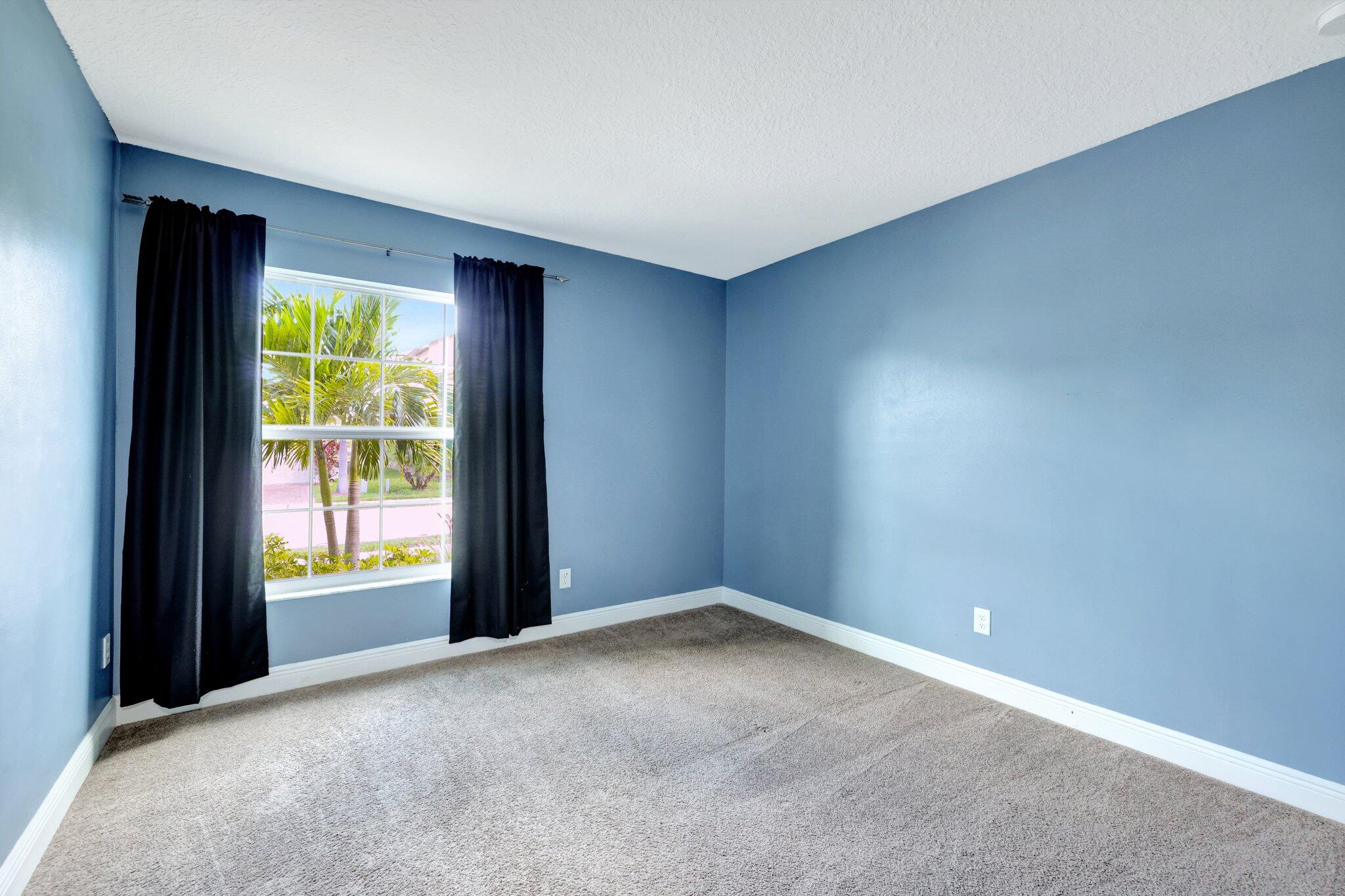 9331 Breakers Row Fort Pierce, FL 34945 - Photo 23 of 39 a view of an empty room with a window