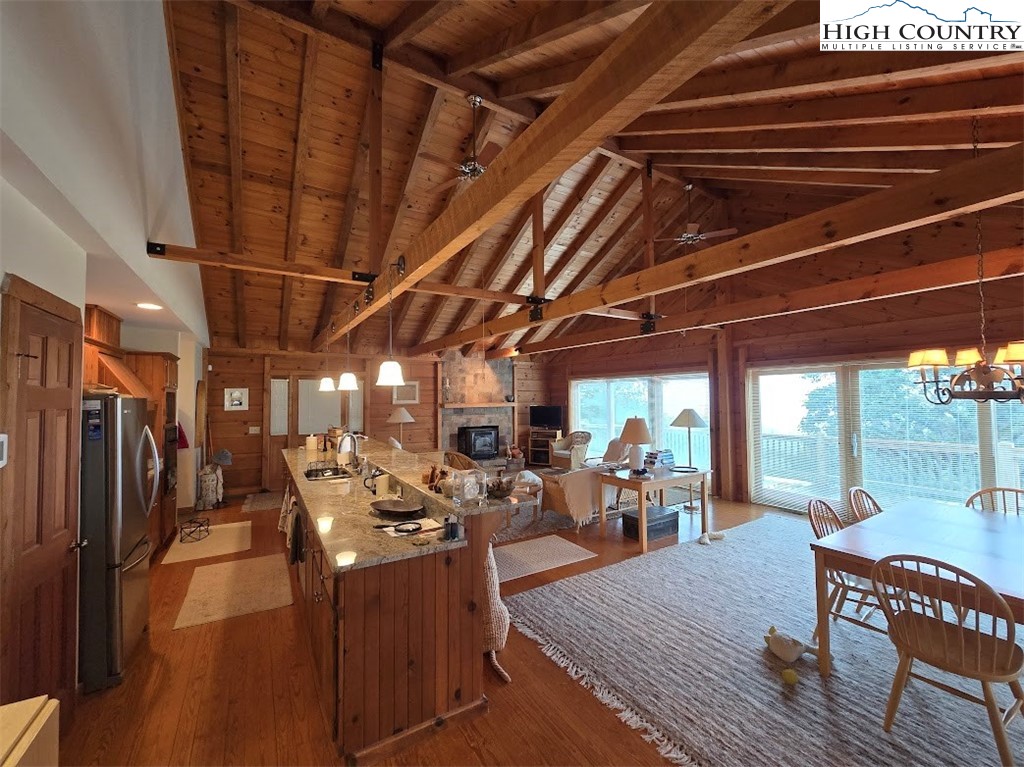 979 Wagon Road Warrensville, NC 28693 - Photo 13 of 50 a view of a studio with wooden floor