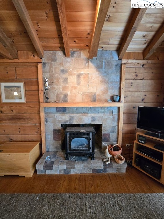 979 Wagon Road Warrensville, NC 28693 - Photo 16 of 50 a living room with furniture and a fireplace