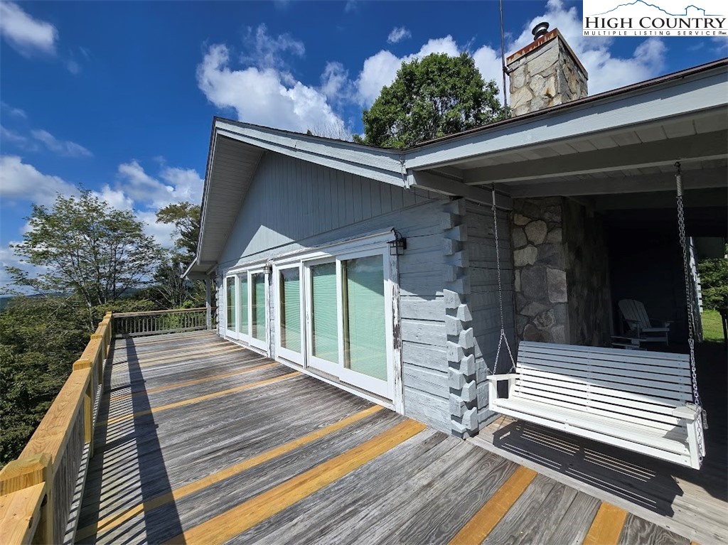 979 Wagon Road Warrensville, NC 28693 - Photo 46 of 50 a view of a two chairs in the balcony