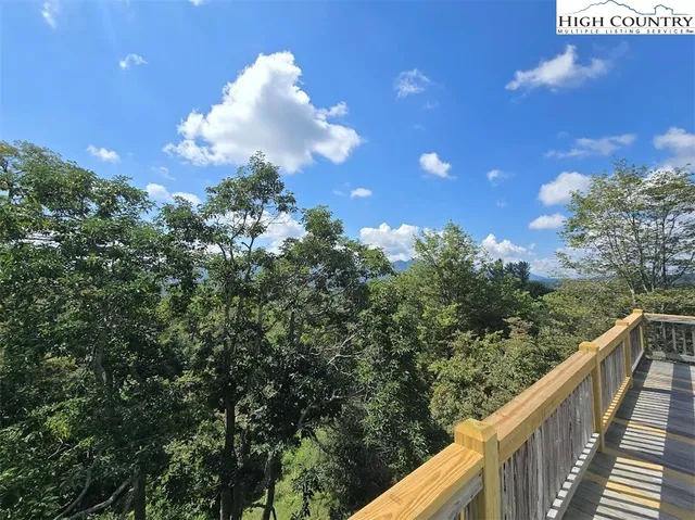 a view of a balcony with an outdoor space