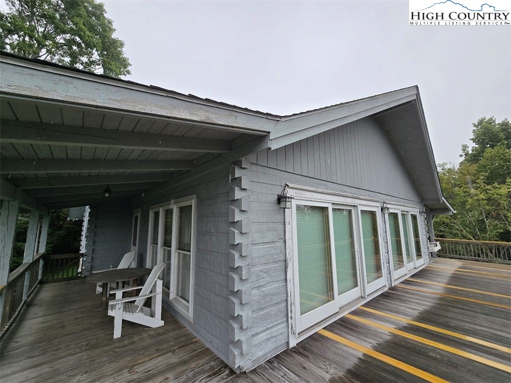 979 Wagon Road Warrensville, NC 28693 - Photo 8 of 50 a view of a two chair in the balcony