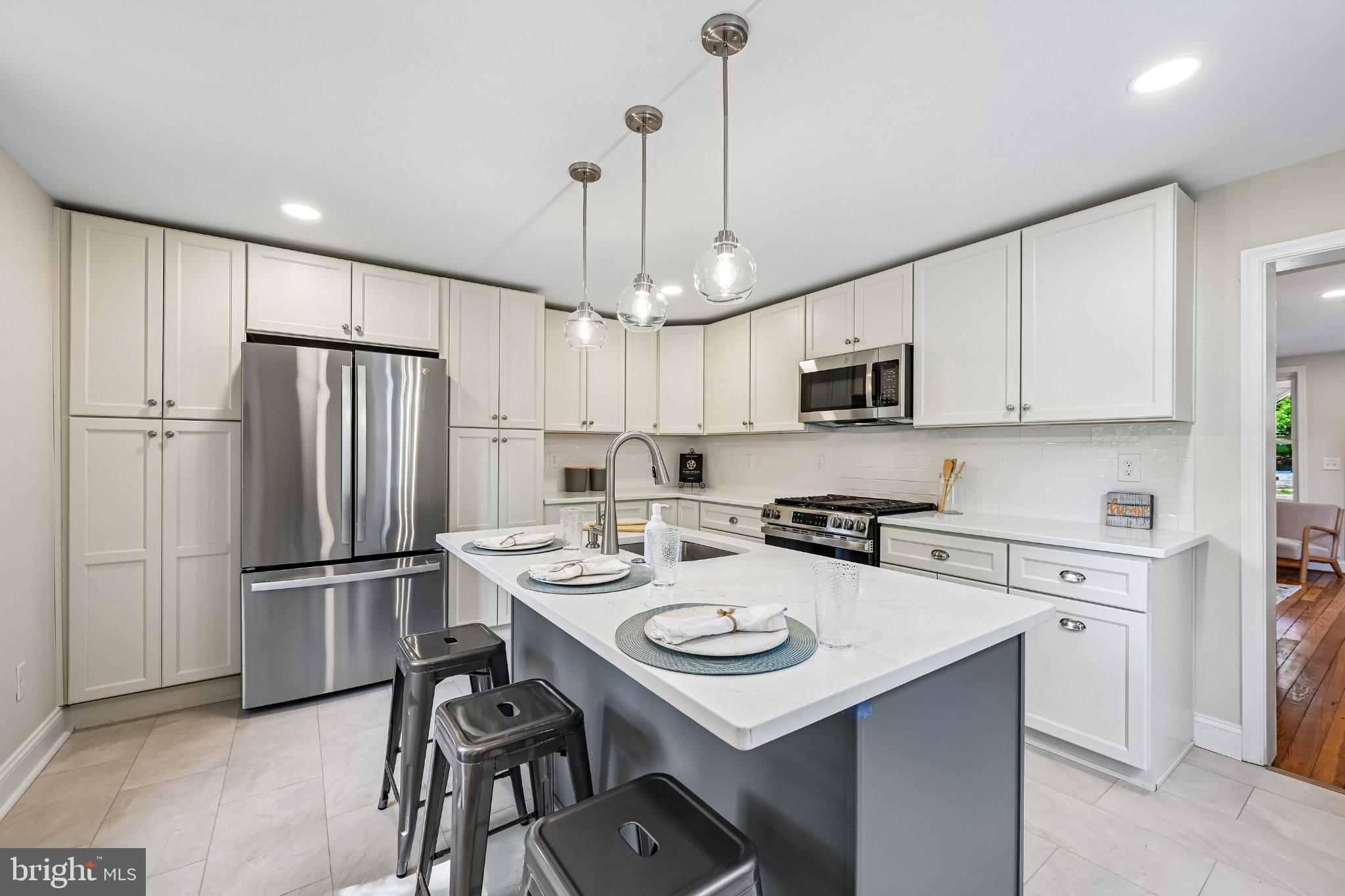 5714 Rusk Avenue Baltimore, MD 21215 - Photo 11 of 51 Modern kitchen with sleek finishes.
