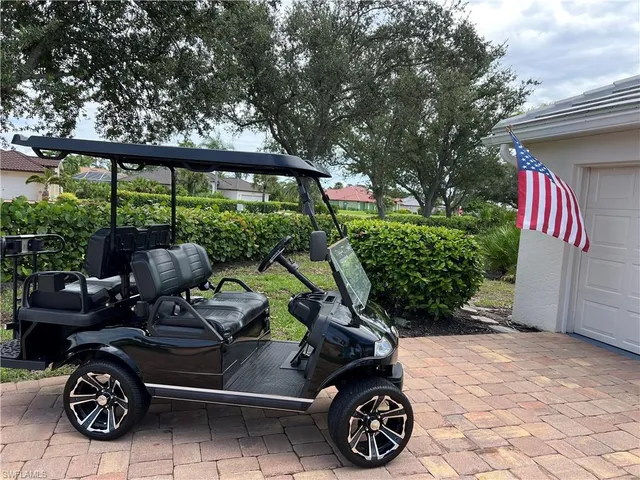 a car parked in front of a house