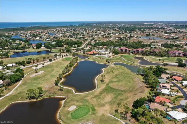 an aerial view of a house with a garden