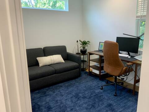 6100 Ponca Street, Unit 2 Austin, TX 78741 - Photo 11 of 17 a living room with furniture and a window