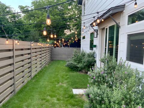 6100 Ponca Street, Unit 2 Austin, TX 78741 - Photo 15 of 17 a view of a pathway of a house with a yard