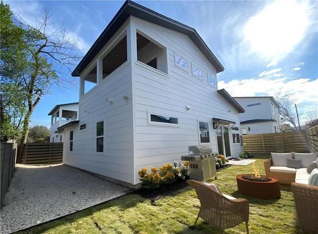 a front view of a house with patio