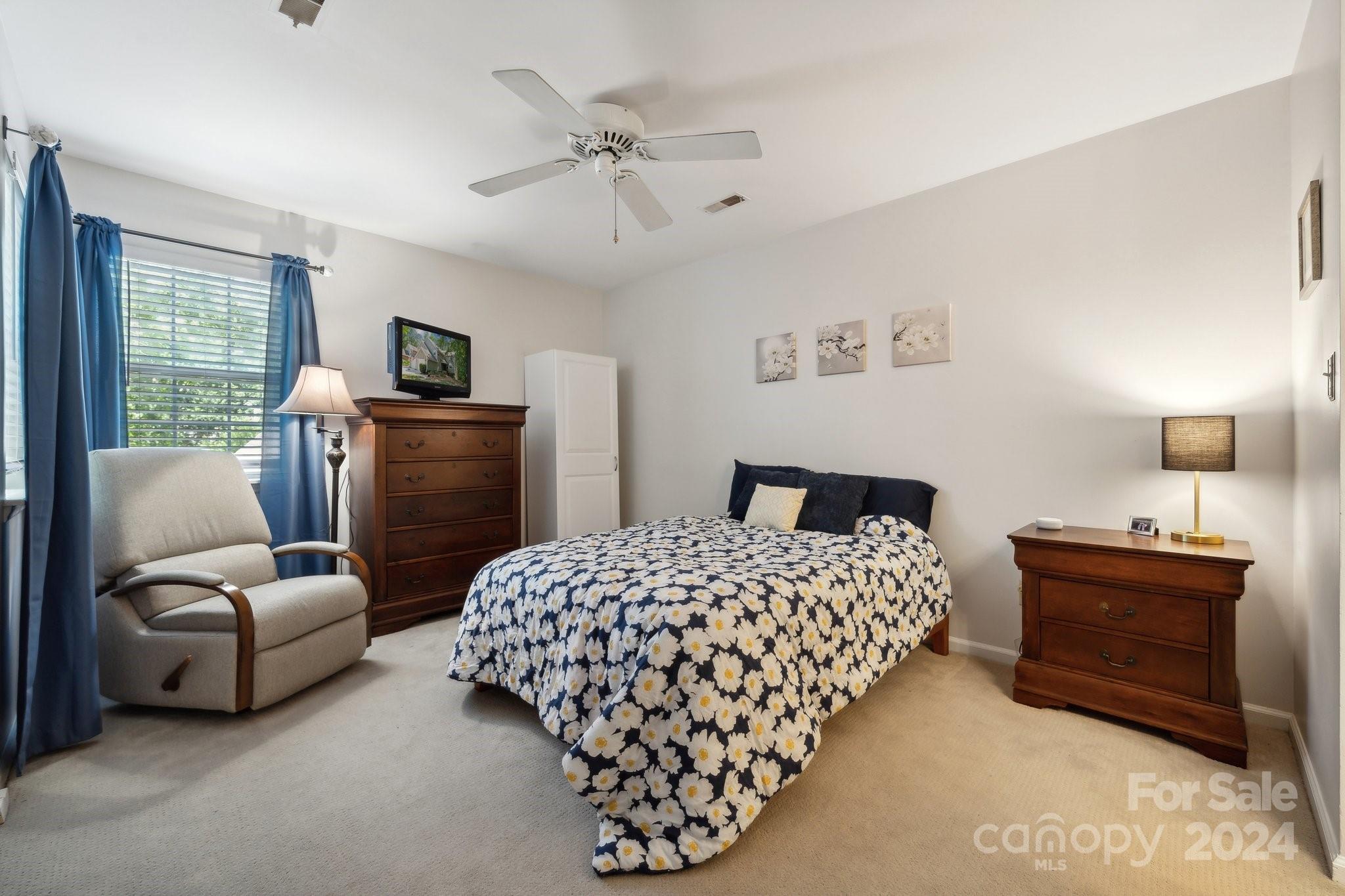 9012 St Thomas Lane Charlotte, NC 28277 - Photo 17 of 25 a bedroom with a bed and furniture