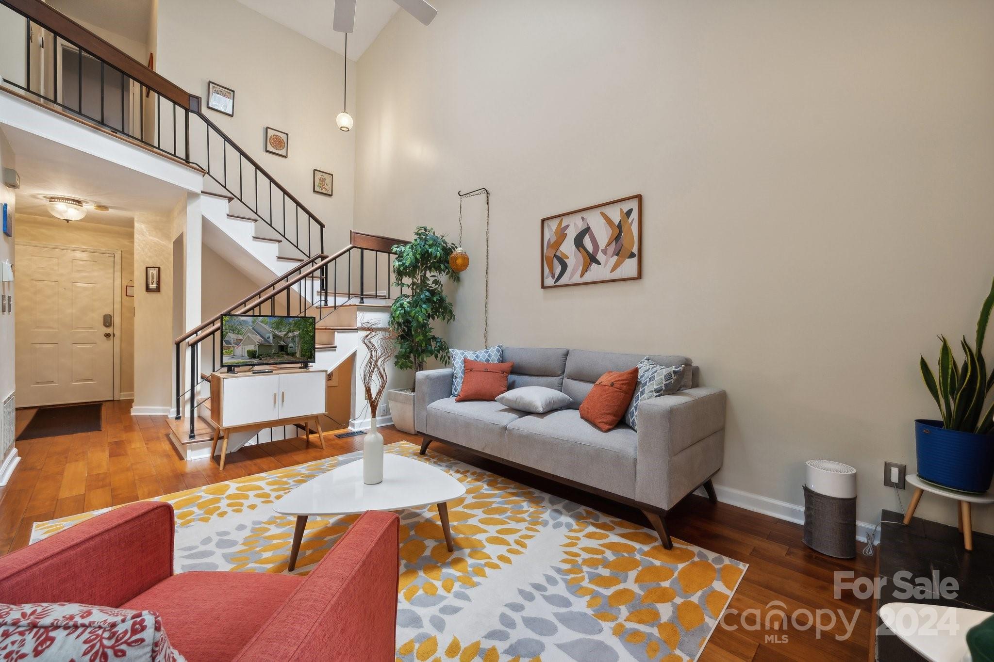9012 St Thomas Lane Charlotte, NC 28277 - Photo 3 of 25 a living room with furniture and wooden floor