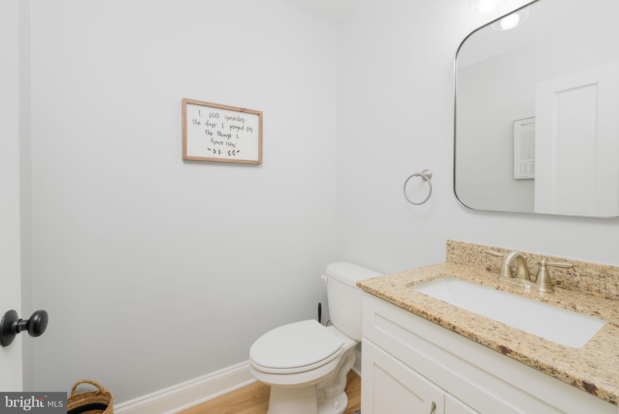 2649 Roberts Station Road Ingleside, MD 21644 - Photo 13 of 47 Chic and modern half-bath retreat.