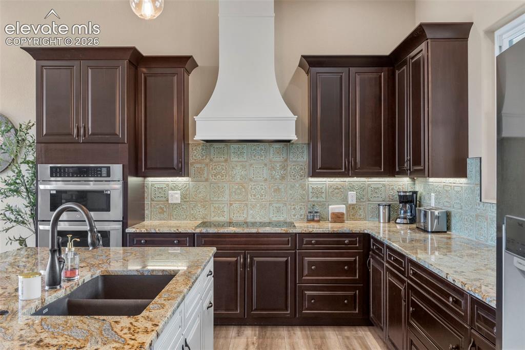 2480 North Log Road Calhan, CO 80808 - Photo 7 of 50 Stunning Upgraded kitchen