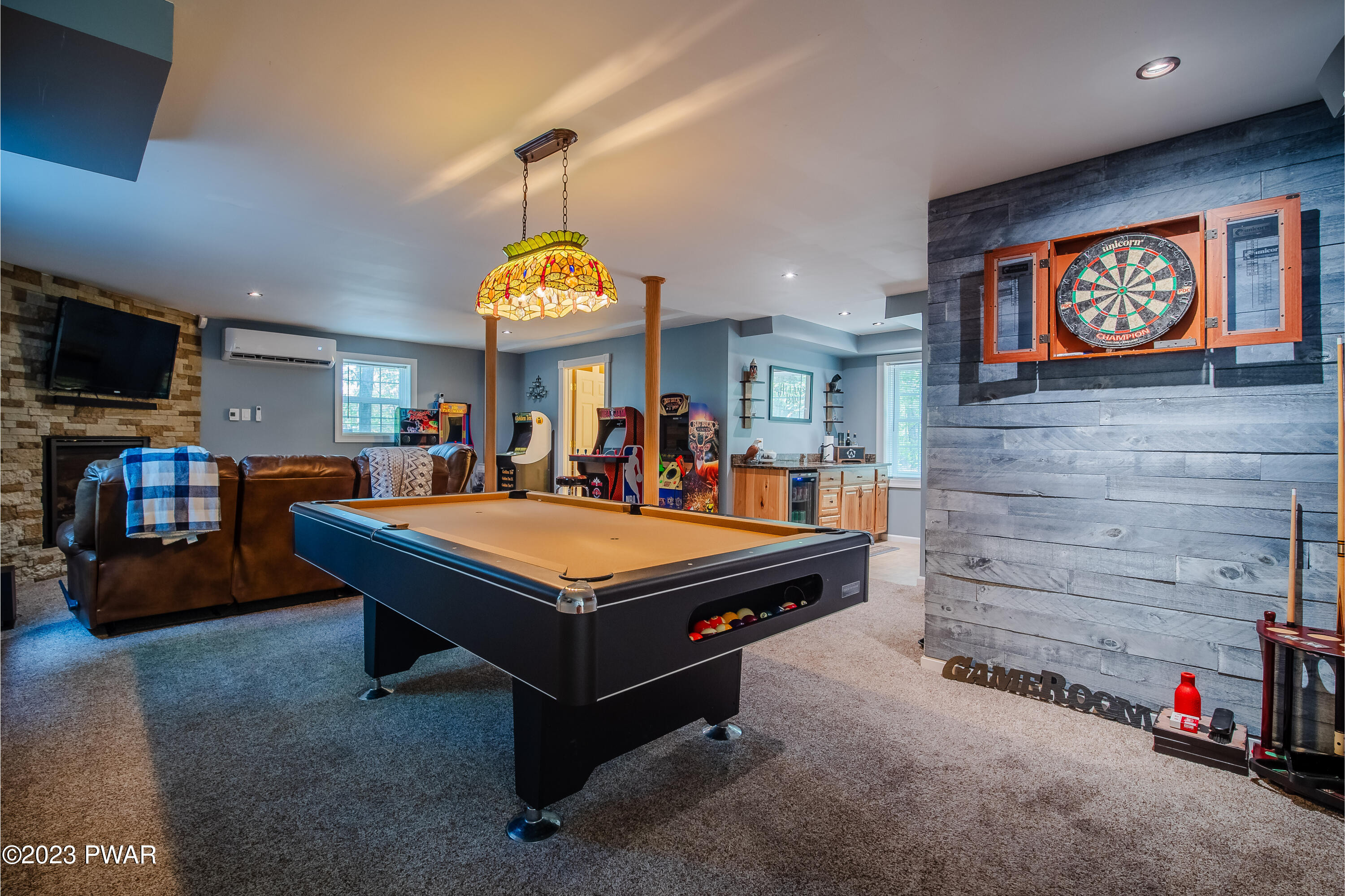 493 Northgate Road Lake Ariel, PA 18436 - Photo 29 of 37 a pool table with chairs and a flat screen tv