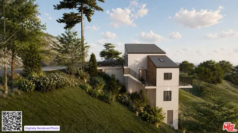 a aerial view of a house with a yard