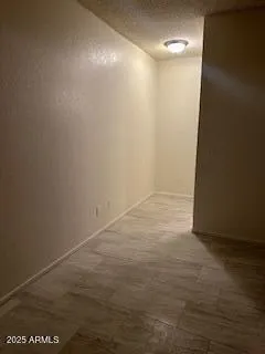 a white toilet sitting next to a bath tub