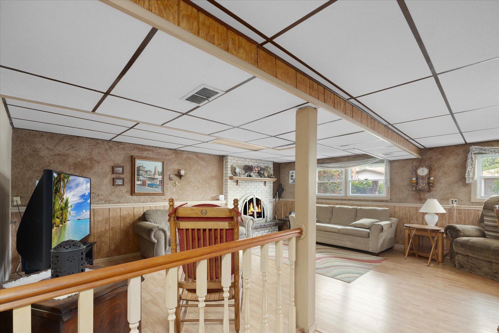 6349 Forestview Drive Oak Forest, IL 60452 - Photo 11 of 18 a living room with furniture and a flat screen tv