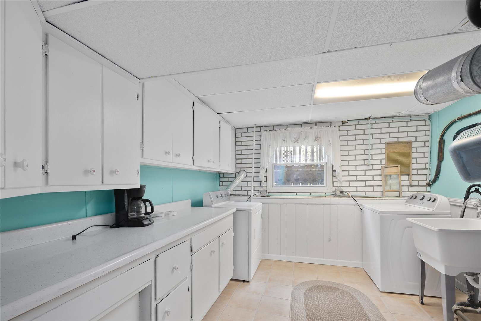 6349 Forestview Drive Oak Forest, IL 60452 - Photo 15 of 18 a kitchen with a sink cabinets and window