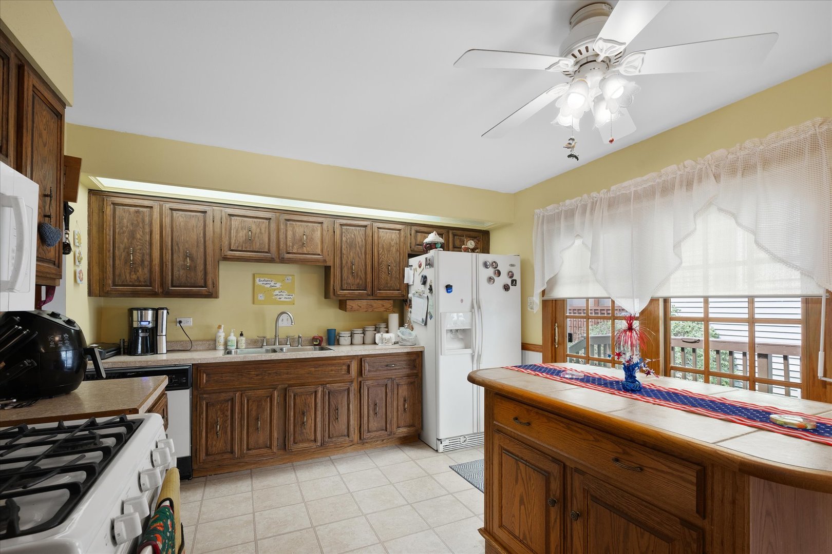 6349 Forestview Drive Oak Forest, IL 60452 - Photo 4 of 18 a kitchen with a sink appliances and cabinets