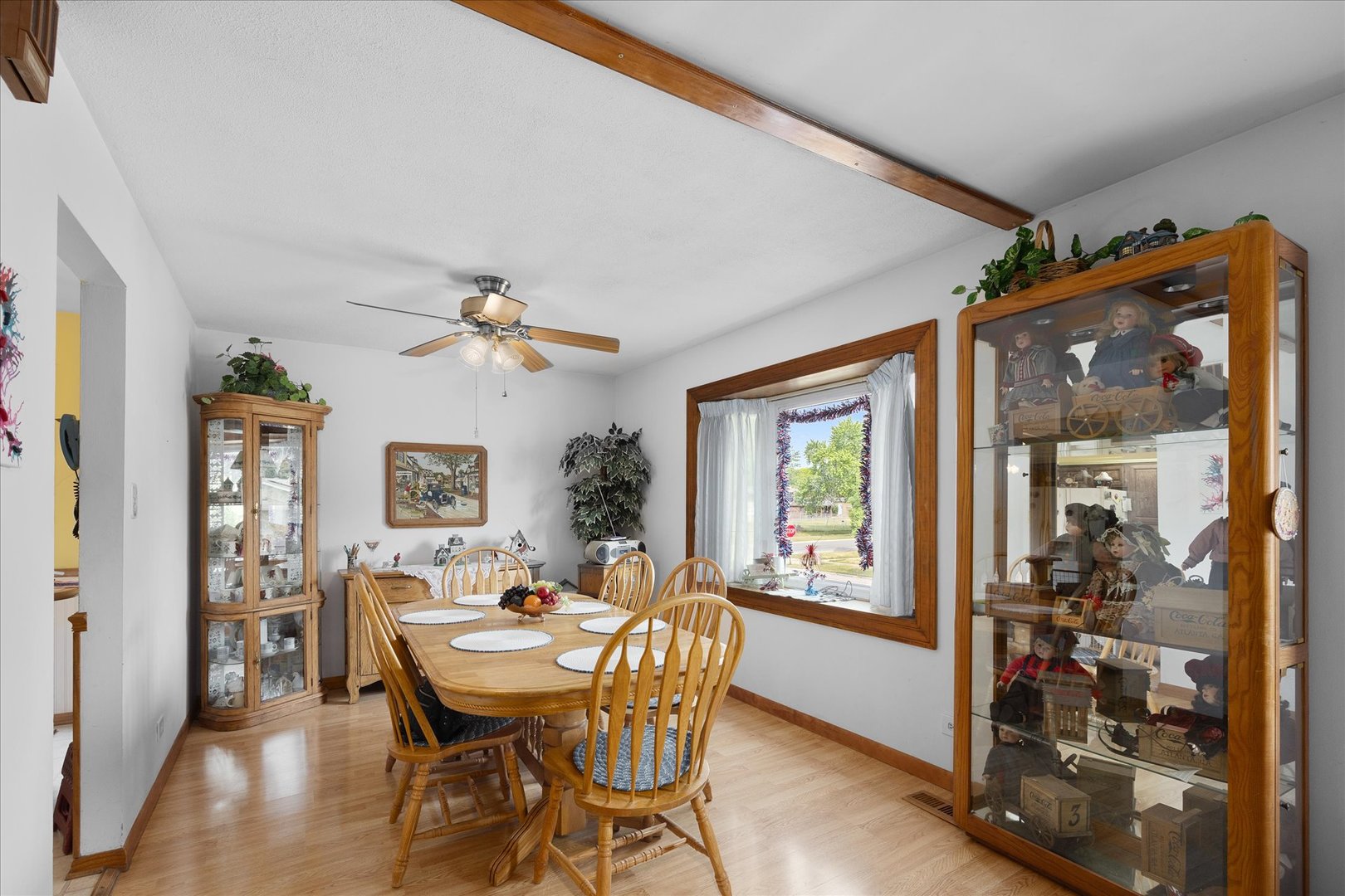 6349 Forestview Drive Oak Forest, IL 60452 - Photo 5 of 18 a view of a dining room with furniture window and wooden floor