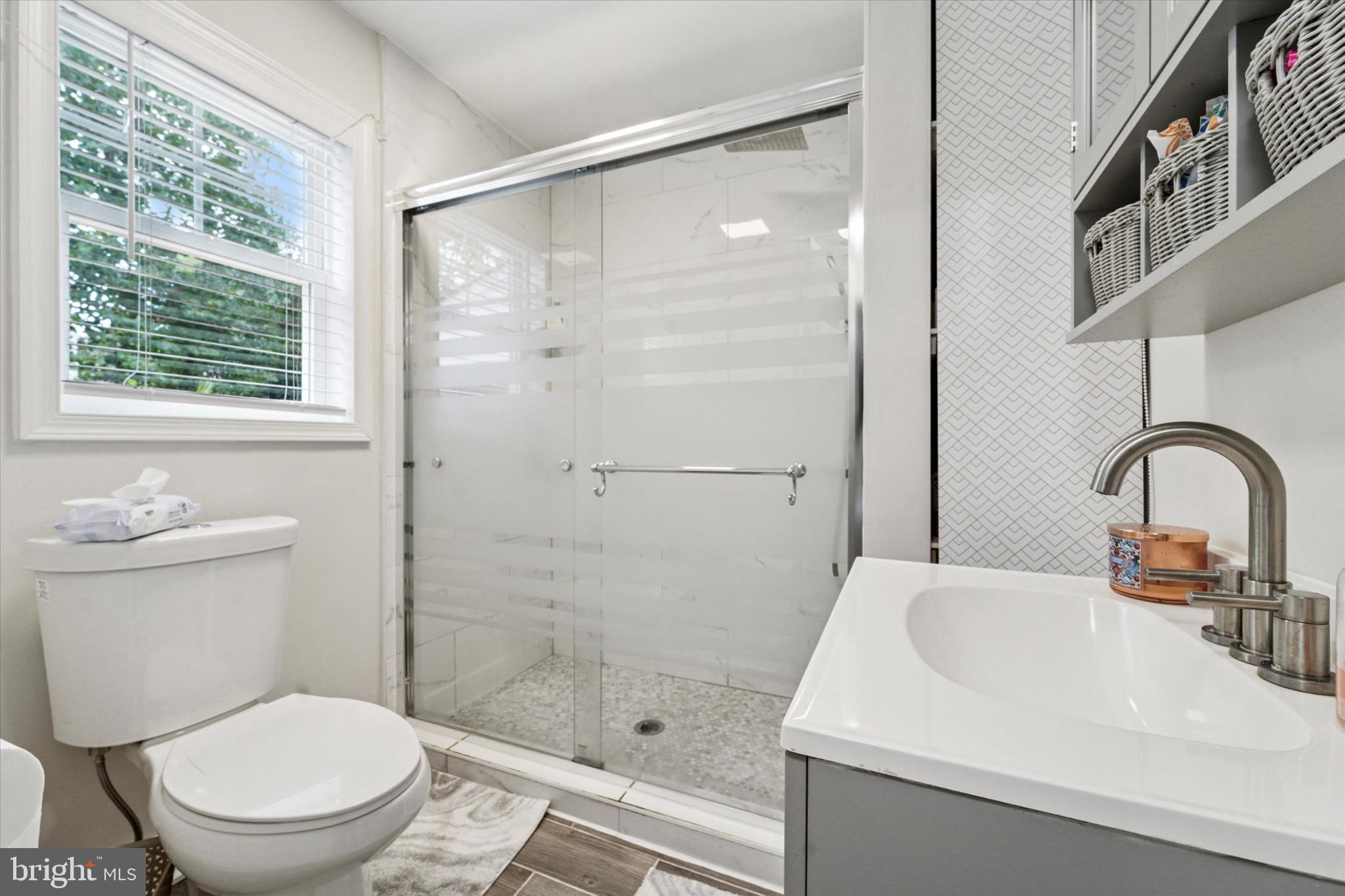 735 Spring Hill Road Feasterville-Trevose, PA 19053 - Photo 15 of 34 Modern bathroom with sleek glass shower.
