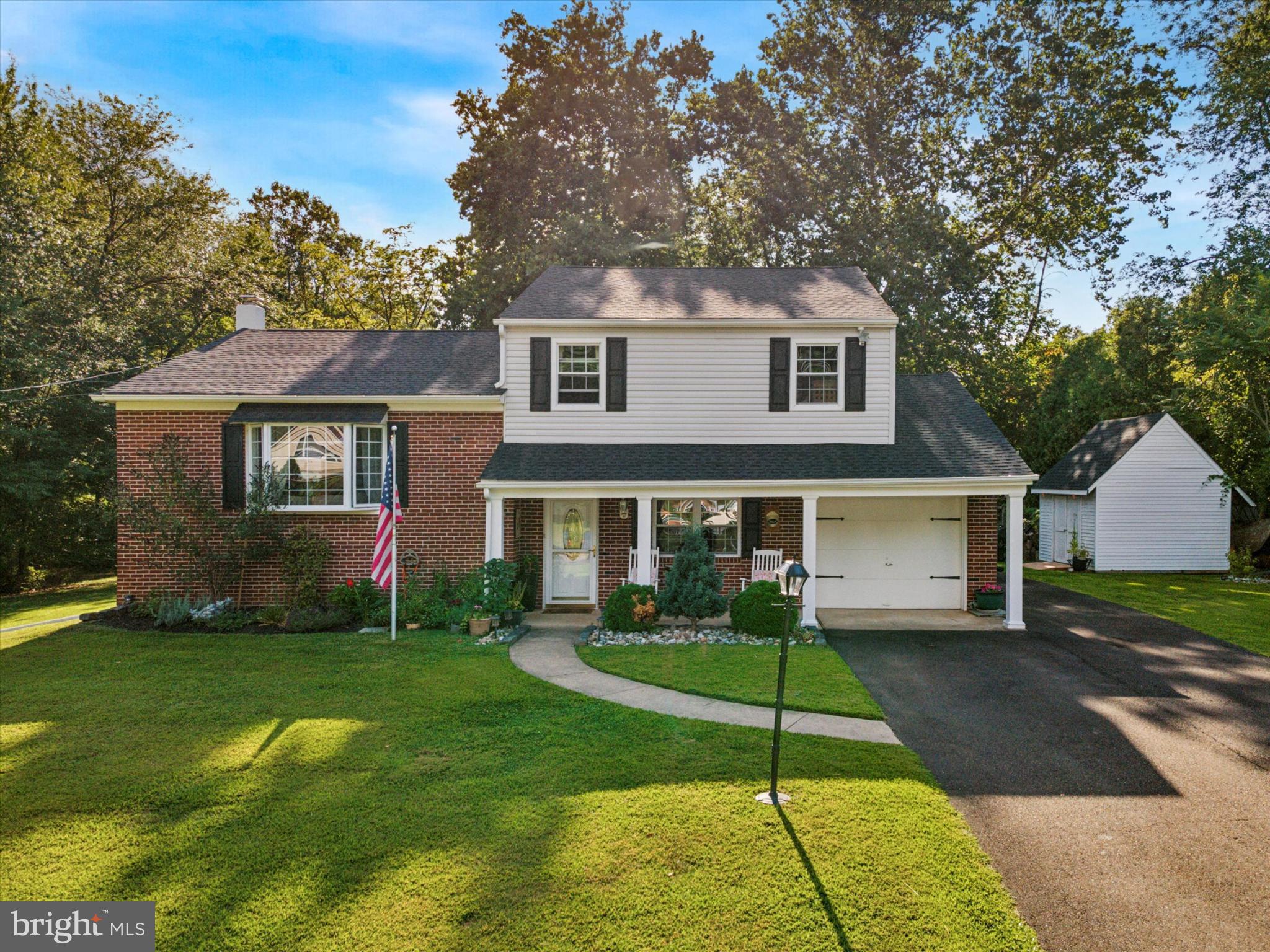735 Spring Hill Road Feasterville-Trevose, PA 19053 - Photo 2 of 34 Charming home with lush greenery and curb appeal.