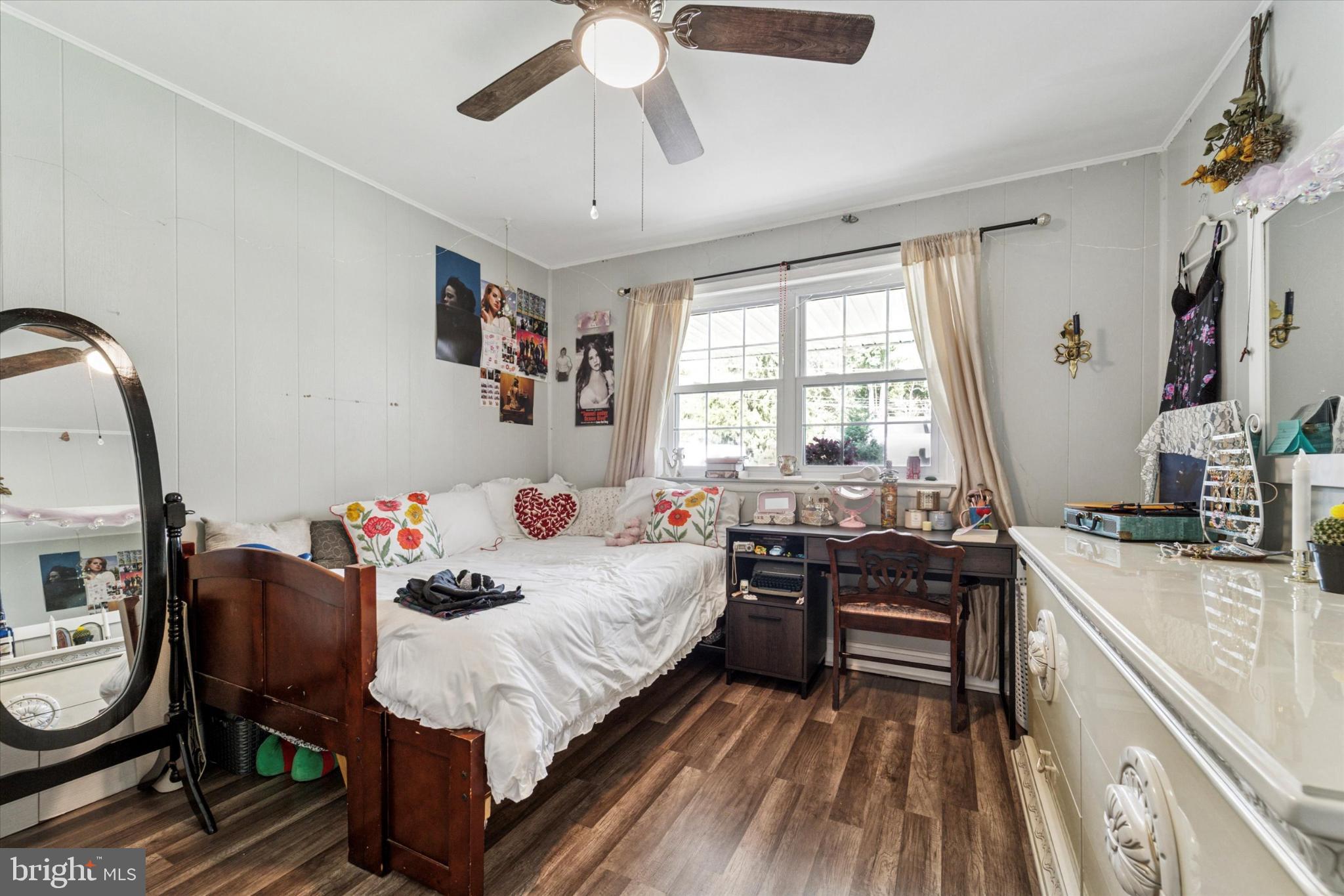 735 Spring Hill Road Feasterville-Trevose, PA 19053 - Photo 22 of 34 Cozy bedroom with natural light and charm.