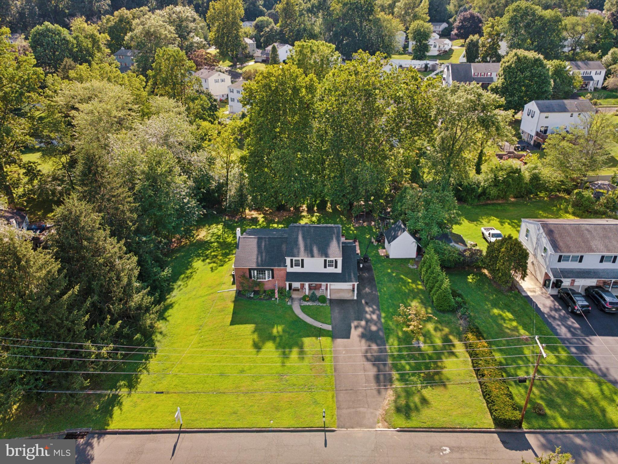735 Spring Hill Road Feasterville-Trevose, PA 19053 - Photo 28 of 34 Spacious home nestled among lush greenery.