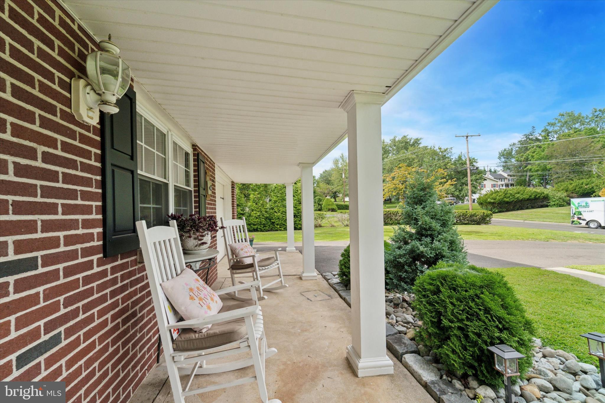 735 Spring Hill Road Feasterville-Trevose, PA 19053 - Photo 3 of 34 Charming porch with serene neighborhood views.