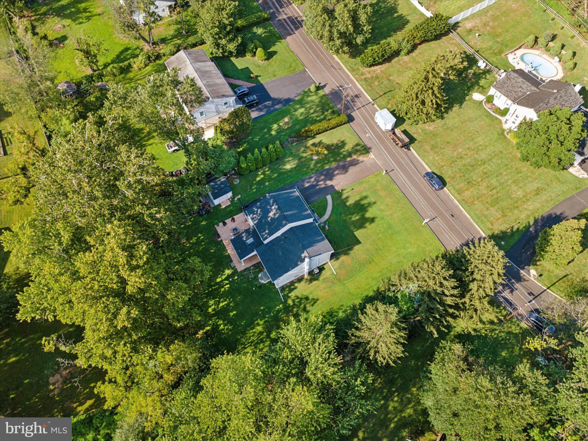 735 Spring Hill Road Feasterville-Trevose, PA 19053 - Photo 33 of 34 Charming home nestled in lush greenery.