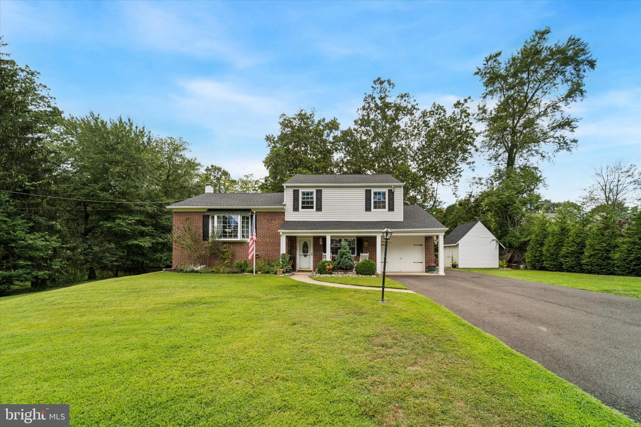 735 Spring Hill Road Feasterville-Trevose, PA 19053 - Photo 34 of 34 Charming home nestled in lush greenery.