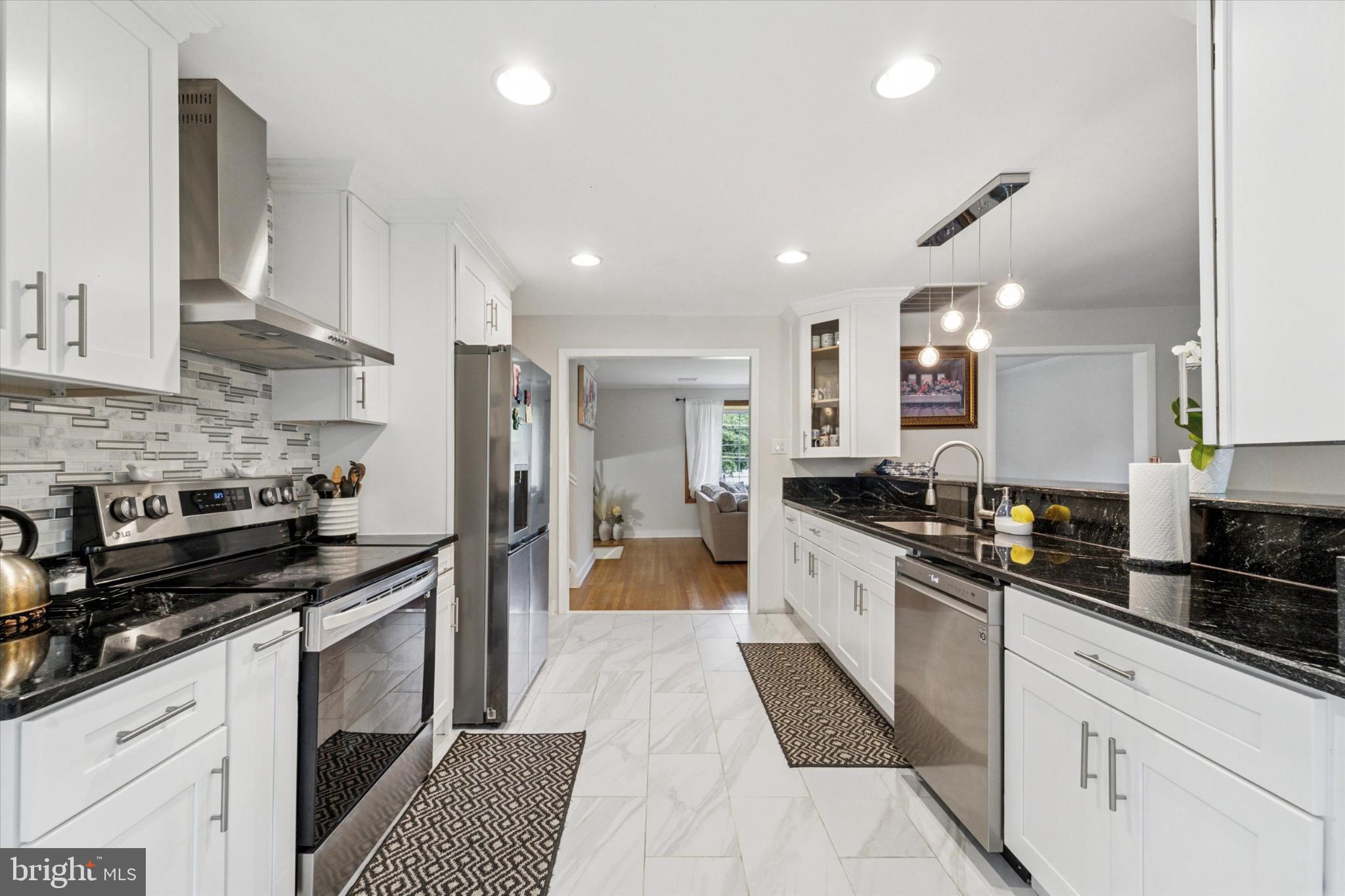 735 Spring Hill Road Feasterville-Trevose, PA 19053 - Photo 4 of 34 Modern kitchen with sleek finishes.