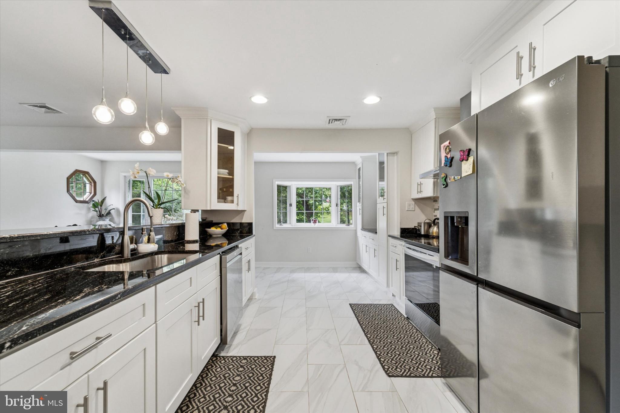735 Spring Hill Road Feasterville-Trevose, PA 19053 - Photo 5 of 34 Modern kitchen with sleek finishes.