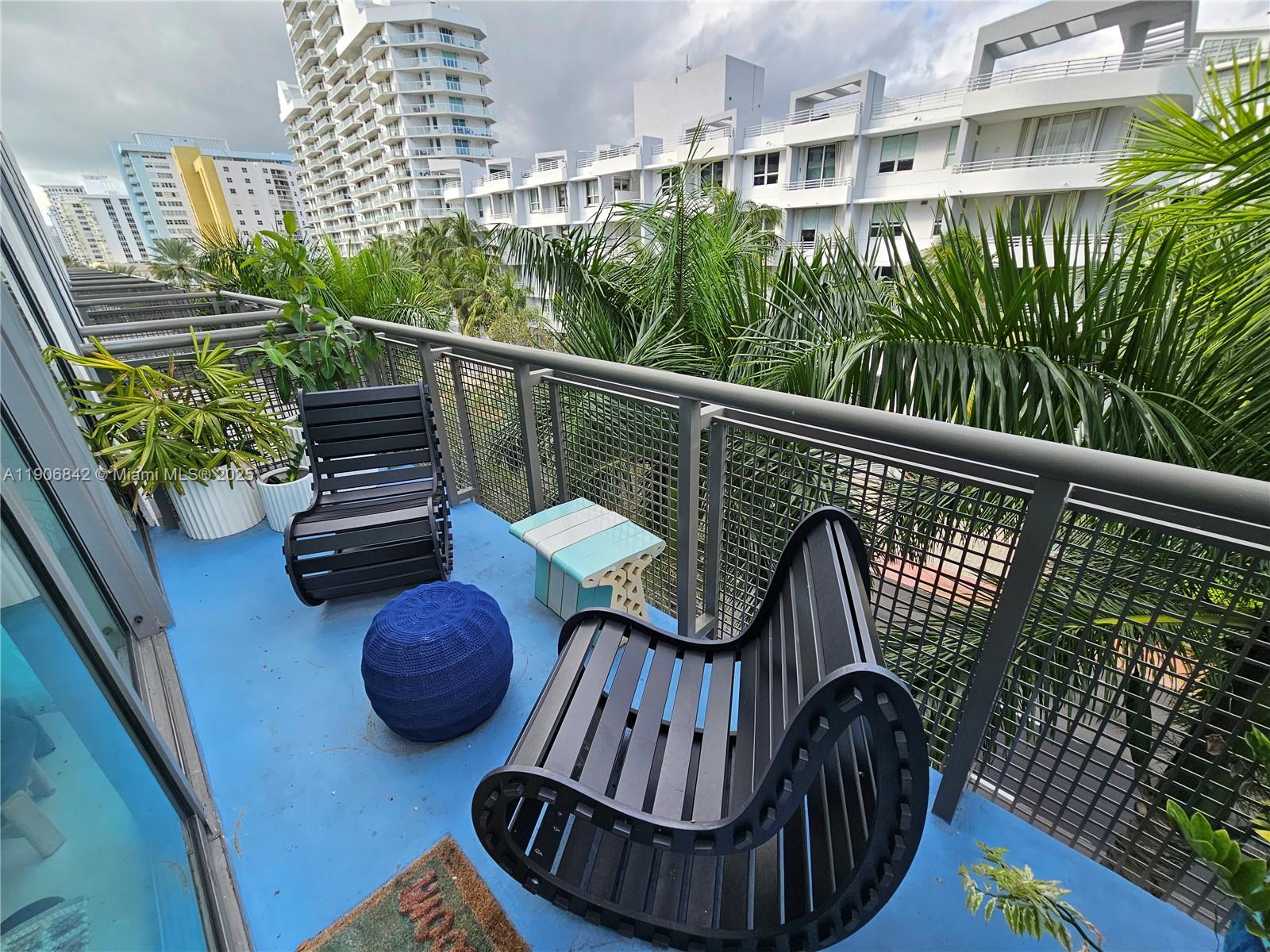 6000 Collins Avenue, Unit 528 Miami Beach, FL 33140 - Photo 18 of 26 a view of balcony with furniture