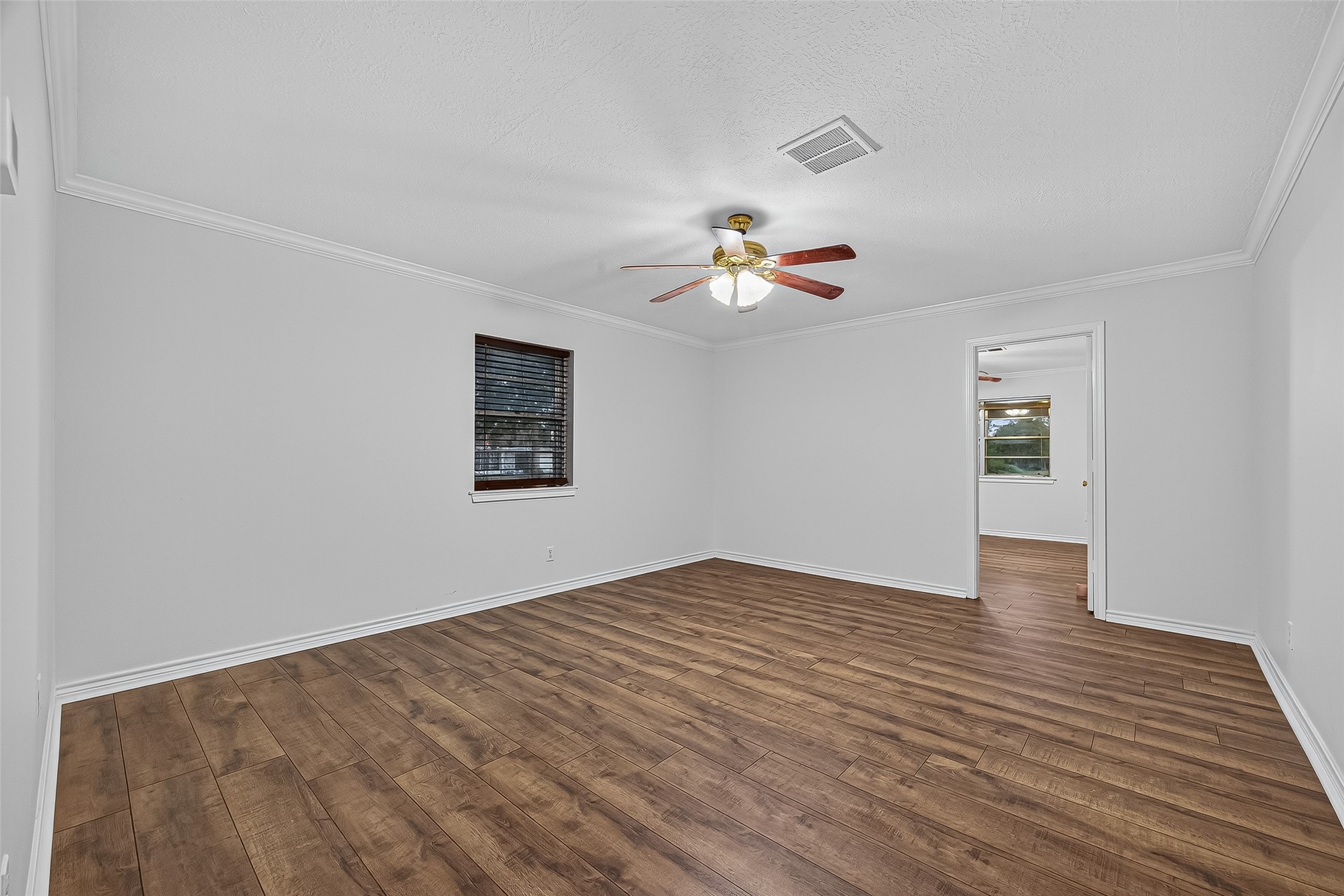 3122 Kueck Road Rosenberg, TX 77471 - Photo 13 of 25 a view of empty room with wooden floor
