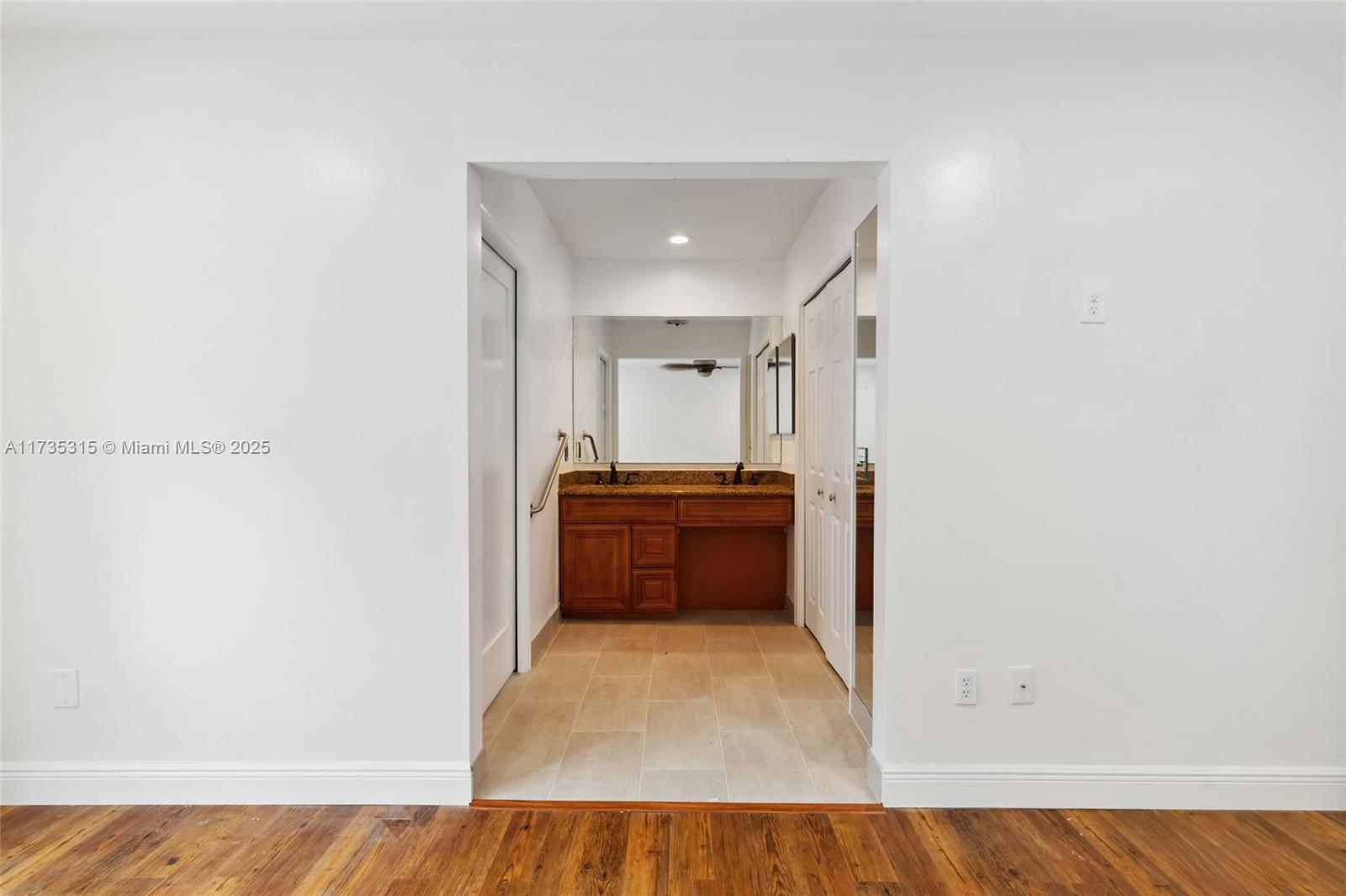 11601 Island Road Cooper City, FL 33026 - Photo 21 of 35 a view of a hallway with a couch